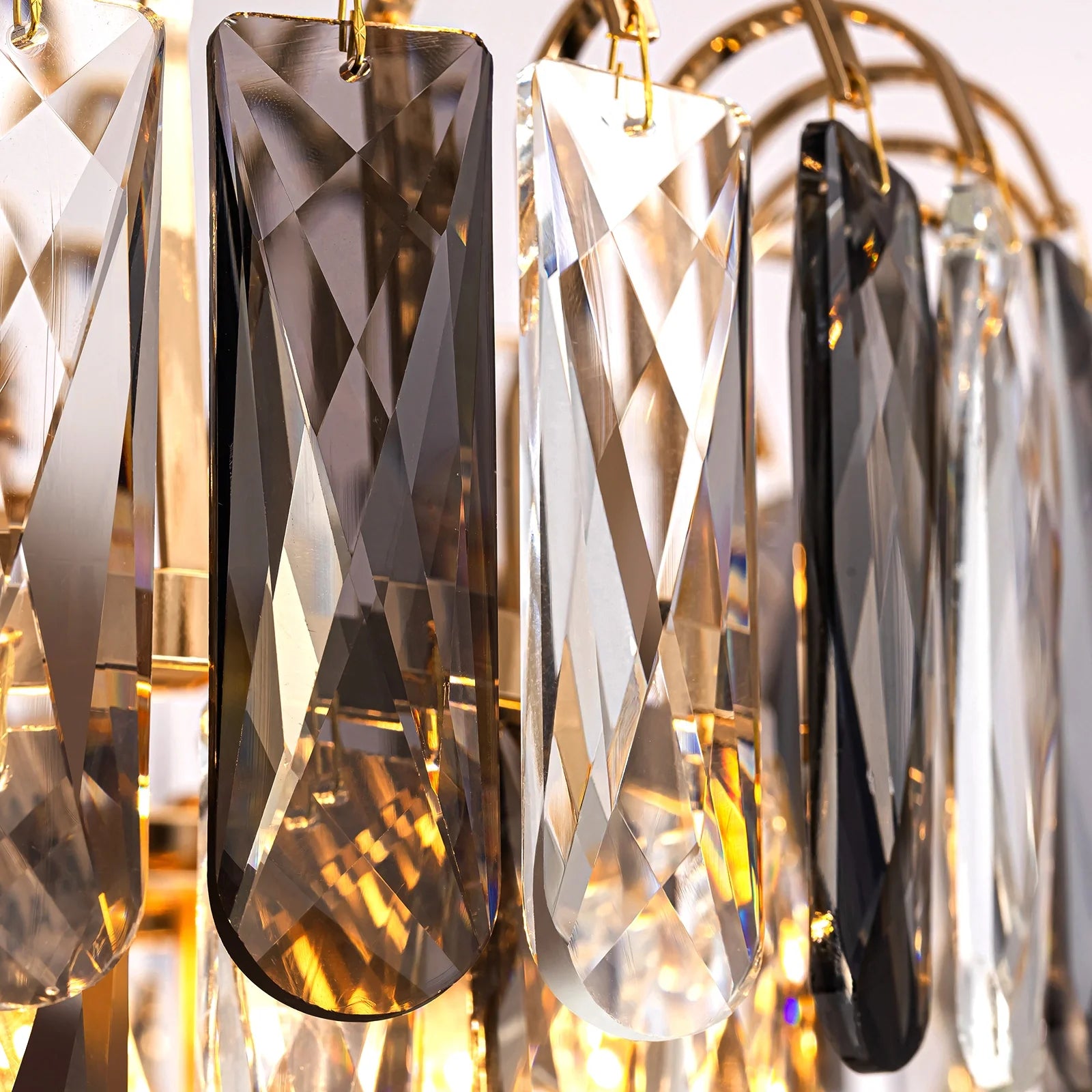 close-up-of-luxury-gold-crystal-tiered-chandelier-sofary-lighting