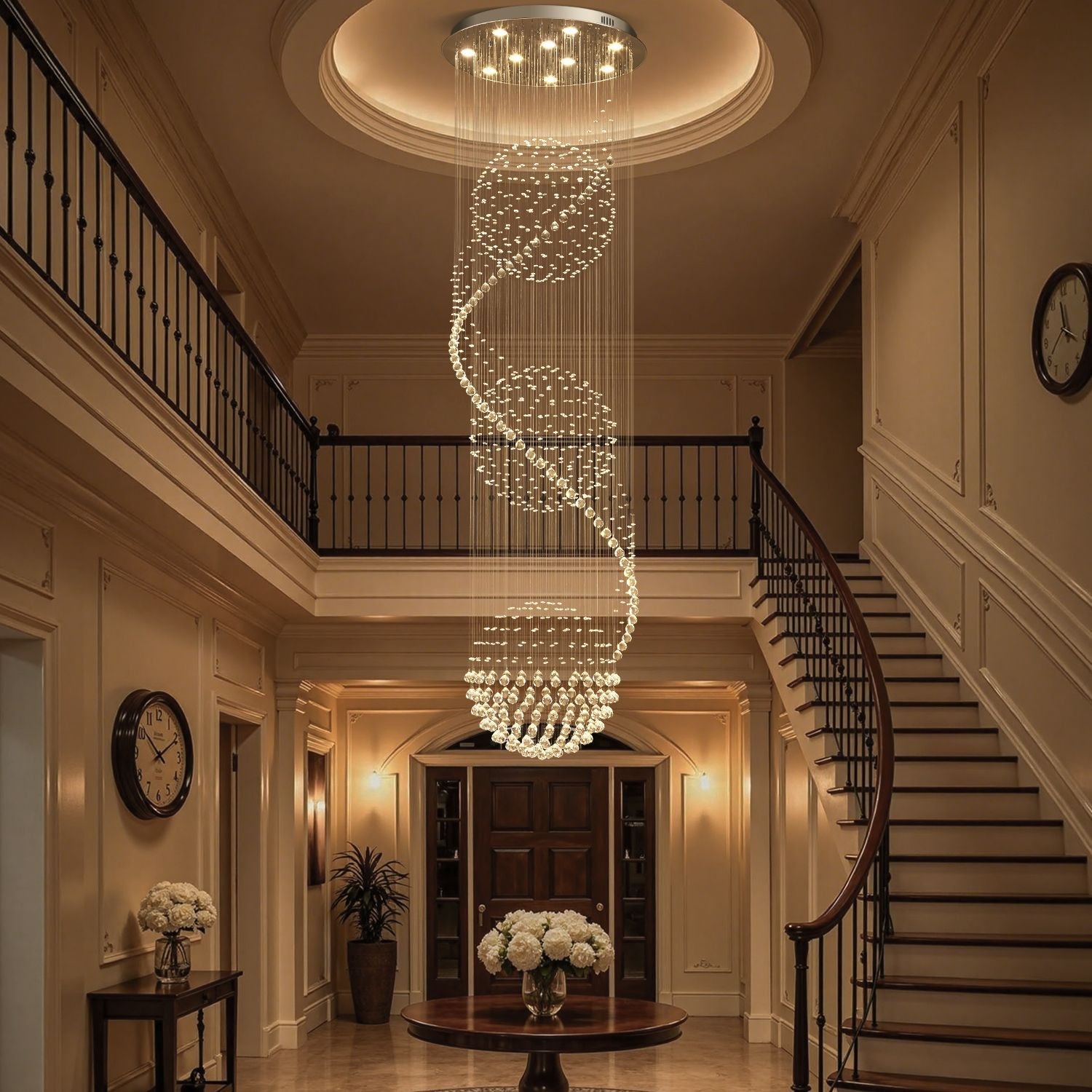 Modern spiral three sphere raindrop crystal chandelier lighting in elegant foyer with staircase | Sofary